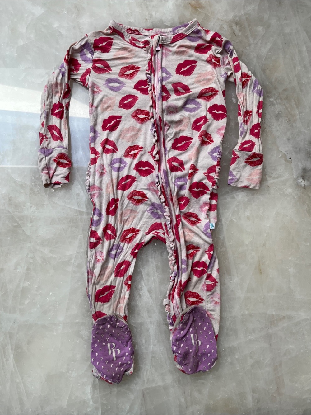 Posh Peanut Valentines Pink & Purple Lip-Print Footed One-Piece